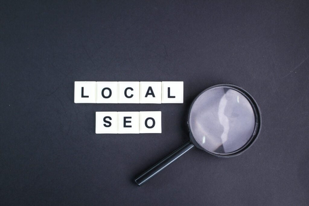 magnifying glass with local seo alphabet words 2023 03 15 08 30 33 utc scaled